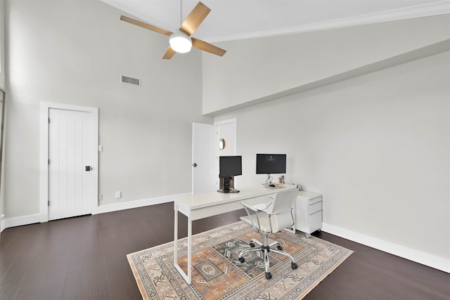 office space featuring dark hardwood / wood-style floors, high vaulted ceiling, and ceiling fan