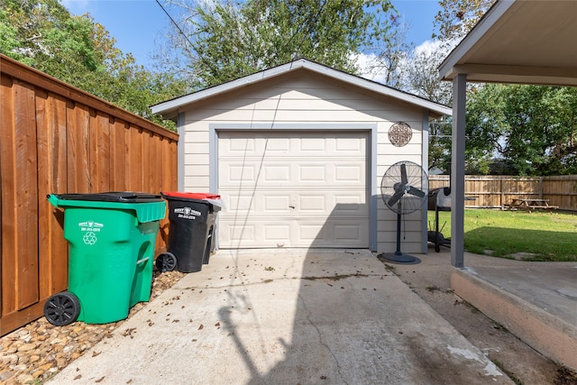 garage with a yard