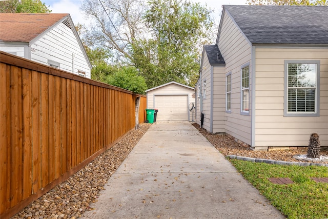 view of home's exterior with an outbuilding and a garage