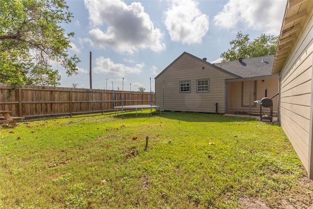 view of yard featuring a trampoline