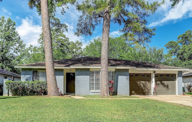 ranch-style home featuring a garage and a front yard