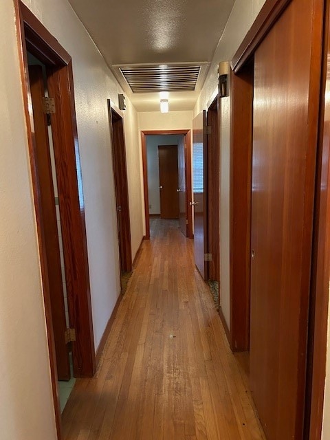 hall featuring light hardwood / wood-style floors