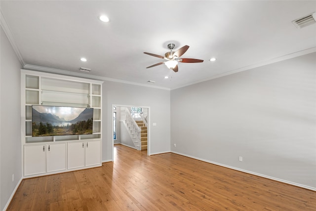 unfurnished living room with ceiling fan, ornamental molding, and light hardwood / wood-style flooring