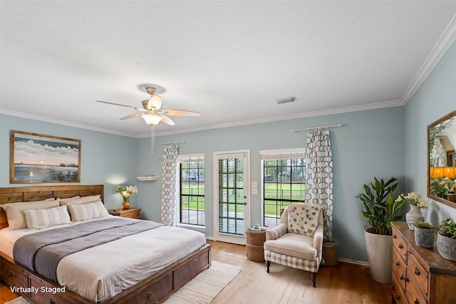 bedroom featuring access to exterior, light wood-type flooring, a textured ceiling, ceiling fan, and crown molding