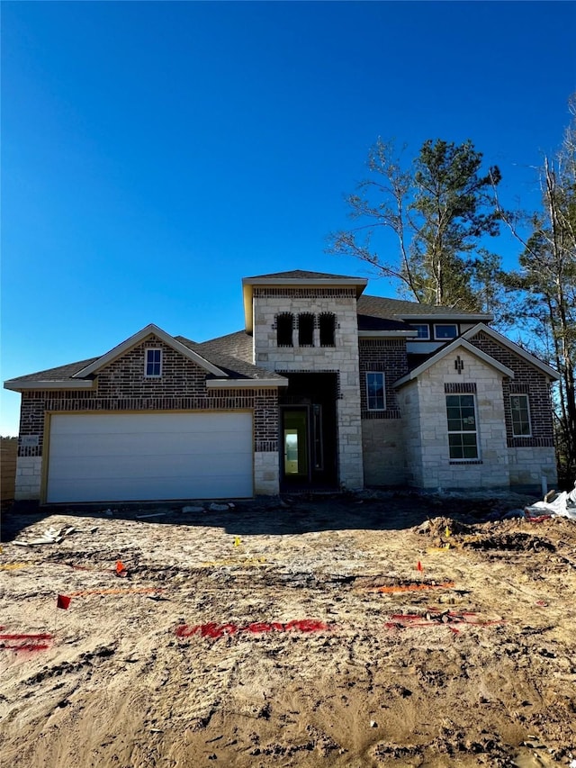 view of front of home featuring a garage