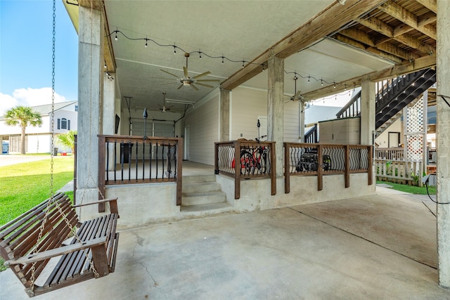 view of patio featuring ceiling fan and covered porch