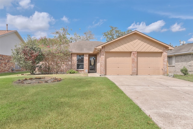 ranch-style house featuring a garage and a front lawn