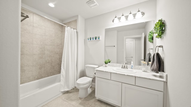 full bathroom featuring tile patterned flooring, vanity, shower / tub combo, and toilet