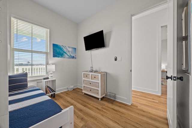 bedroom featuring wood-type flooring