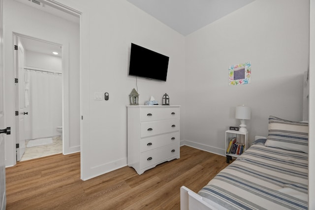 bedroom featuring light hardwood / wood-style floors