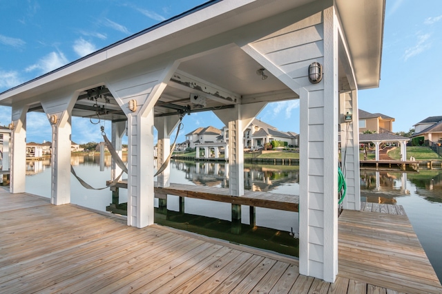 view of dock with a water view