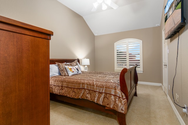 bedroom featuring light colored carpet, ceiling fan, and lofted ceiling