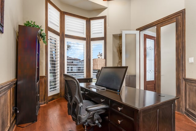 office with dark wood-type flooring