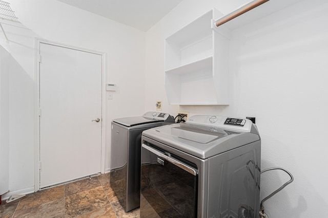 laundry room featuring independent washer and dryer