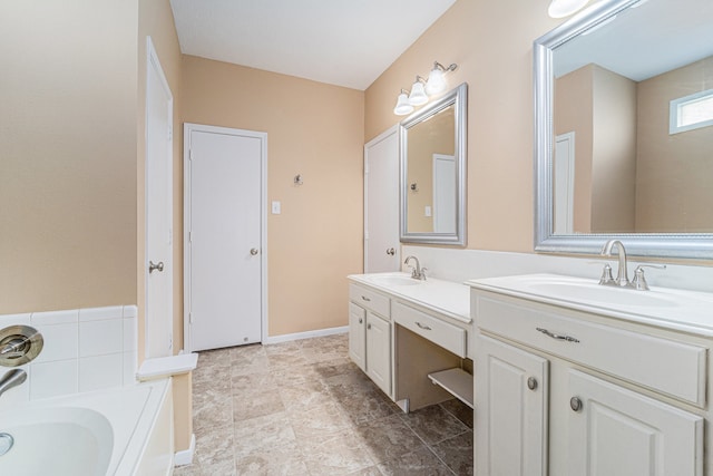 bathroom featuring vanity and a bathtub