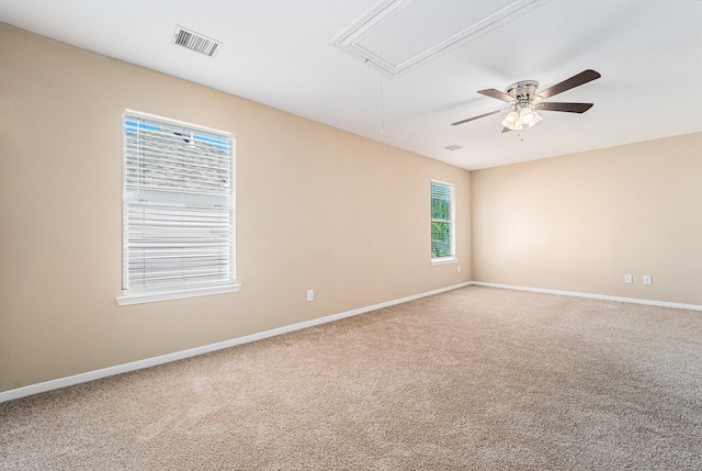 carpeted empty room with ceiling fan