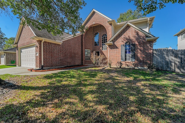 front facade with a front yard and a garage