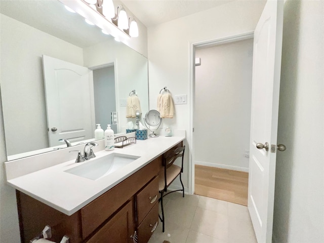 bathroom featuring vanity and hardwood / wood-style flooring