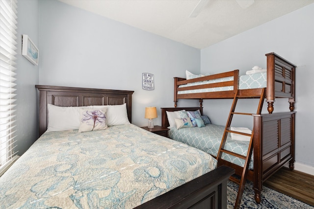 bedroom featuring ceiling fan and hardwood / wood-style floors