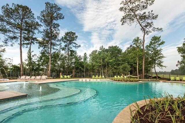 view of pool featuring a patio