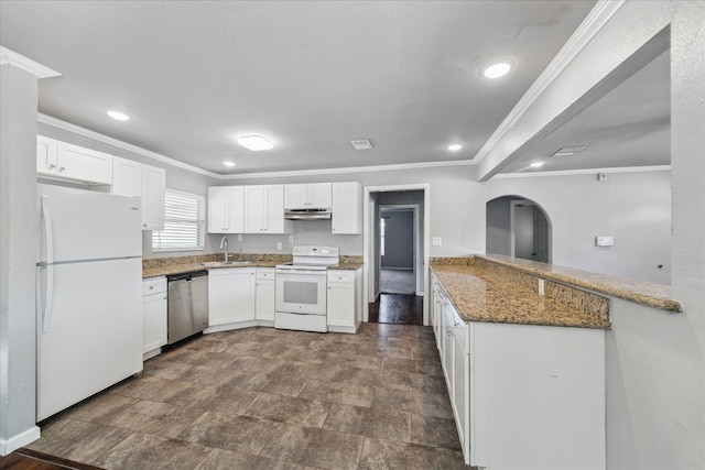 kitchen with white cabinets, white appliances, and sink