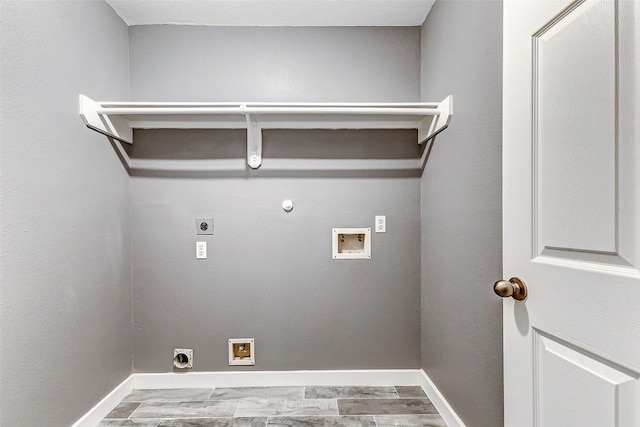 laundry area with electric dryer hookup, hookup for a gas dryer, and hookup for a washing machine