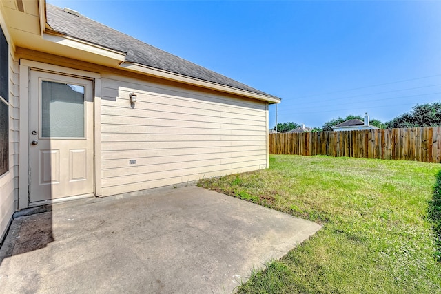 exterior space featuring a patio area and a yard