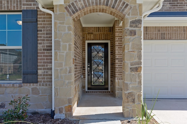 entrance to property with a garage