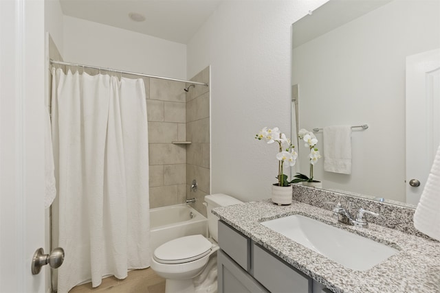 full bathroom with hardwood / wood-style flooring, vanity, toilet, and shower / bathtub combination with curtain