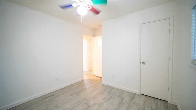 unfurnished bedroom featuring light hardwood / wood-style flooring and ceiling fan