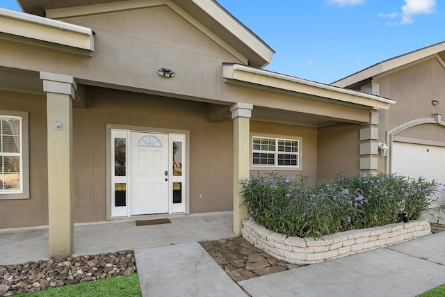 entrance to property with a garage