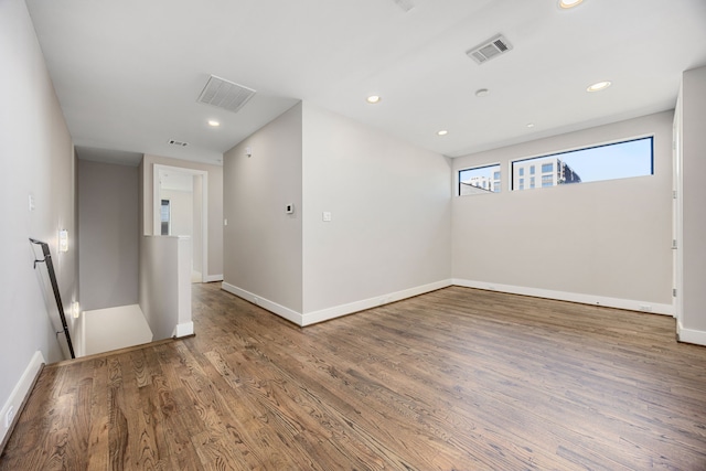 empty room featuring hardwood / wood-style floors