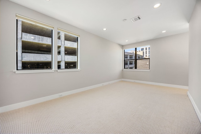 view of carpeted spare room