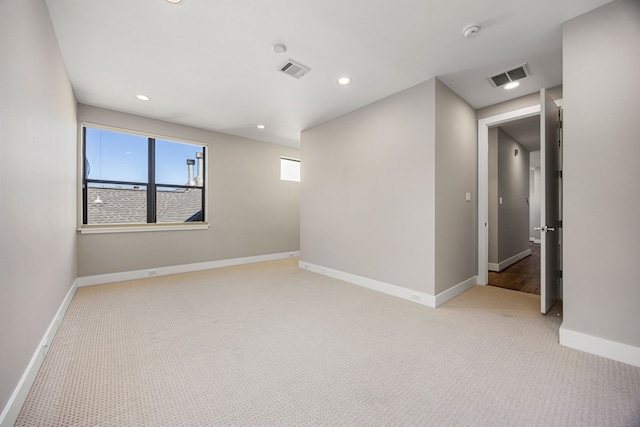 view of carpeted spare room