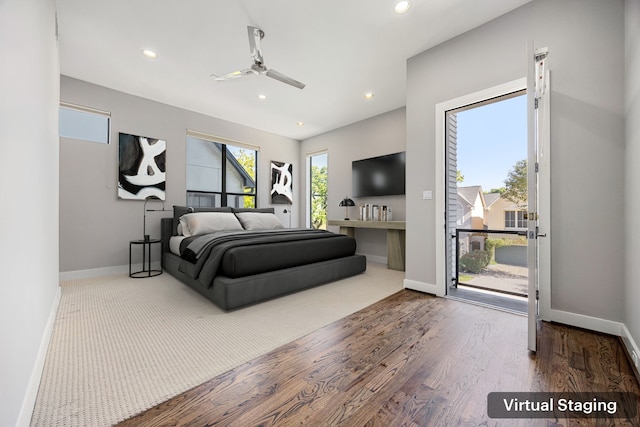 bedroom featuring hardwood / wood-style floors, ceiling fan, and access to exterior