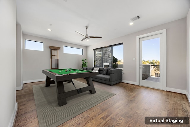 recreation room with hardwood / wood-style flooring, ceiling fan, and pool table