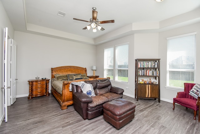 bedroom featuring hardwood / wood-style flooring and ceiling fan