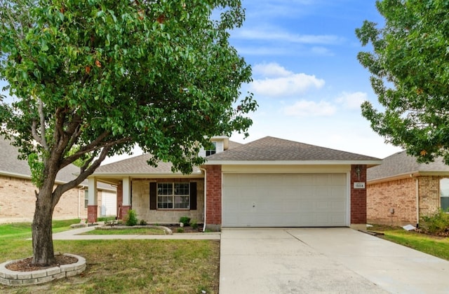 ranch-style home featuring a garage and a front lawn