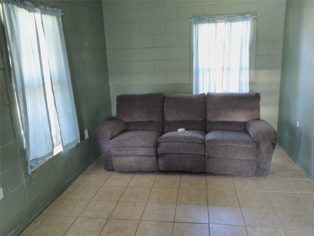 living room featuring light tile patterned flooring