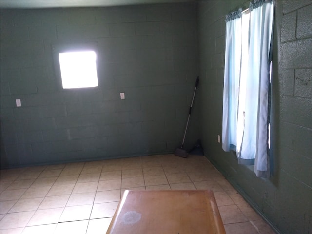 spare room with light tile patterned floors