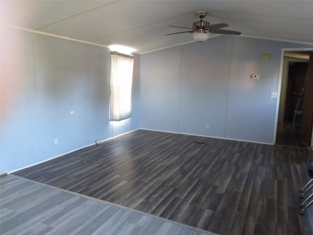 empty room featuring dark hardwood / wood-style floors and ceiling fan