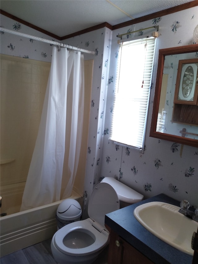 full bathroom featuring vanity, a healthy amount of sunlight, shower / tub combo, and toilet