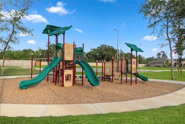 view of playground with a yard