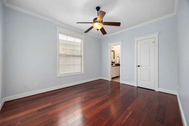 unfurnished bedroom featuring ceiling fan, dark hardwood / wood-style flooring, ornamental molding, and ensuite bathroom