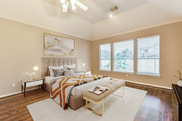 bedroom with vaulted ceiling, ceiling fan, dark hardwood / wood-style floors, and ornamental molding