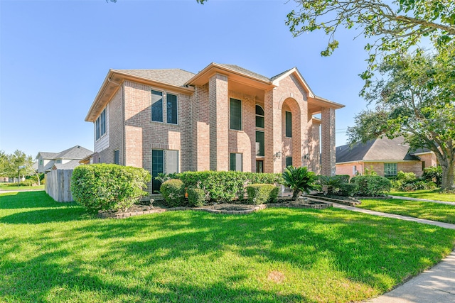 view of front of home with a front yard