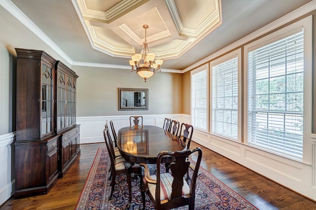 dining space featuring an inviting chandelier, dark wood-type flooring, and ornamental molding