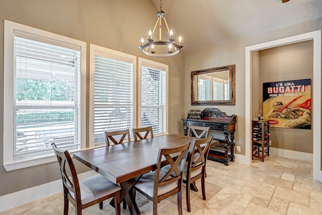 dining space featuring an inviting chandelier