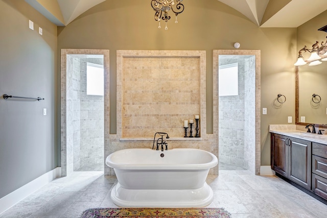 bathroom with vanity, vaulted ceiling, tile walls, and a bathing tub