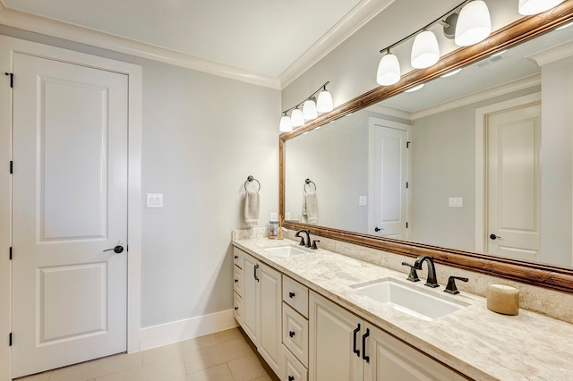 bathroom featuring crown molding, tile patterned flooring, and vanity